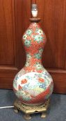 A tall Chinese balloon vase attractively decorated