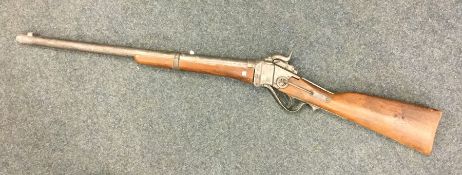 A child's flintlock toy gun. Approx. 95 cms long.