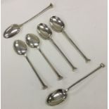 A set of six Edwardian silver nail top spoons. She