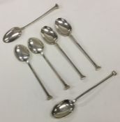 A set of six Edwardian silver nail top spoons. She