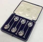 A boxed set of six Edwardian nail top silver spoon