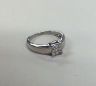 A nine stone diamond cluster ring in claw mount. A