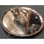 A large Georgian silver salver with beaded rim to