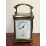 A good quality brass alarm carriage clock with striking