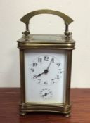 A good quality brass alarm carriage clock with striking