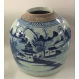 An Eastern blue and white ginger jar decorated wit