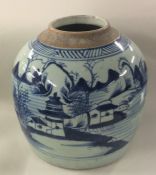 An Eastern blue and white ginger jar decorated wit