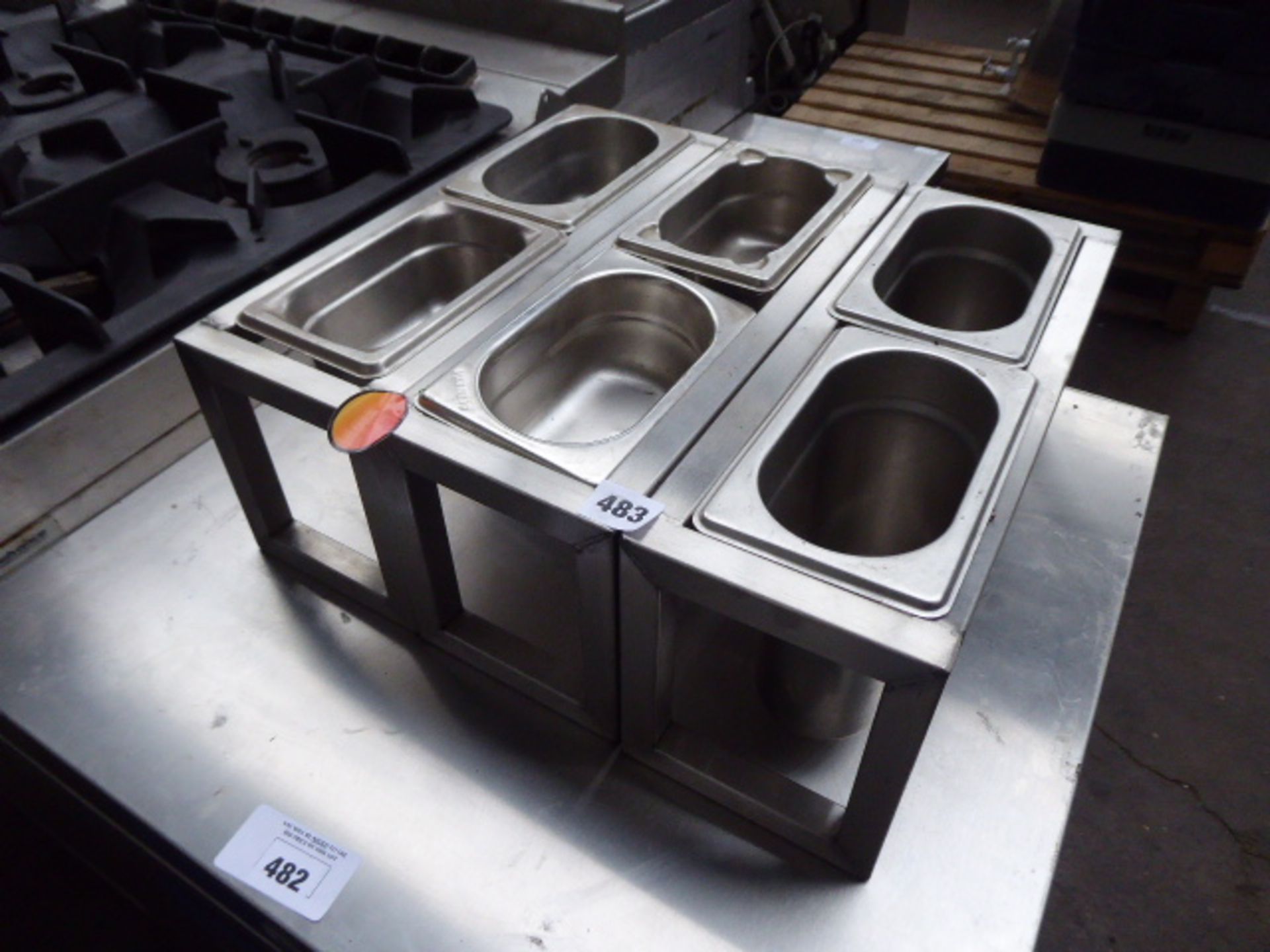 3 stainless steel frames with small gastronorm ingredients tins