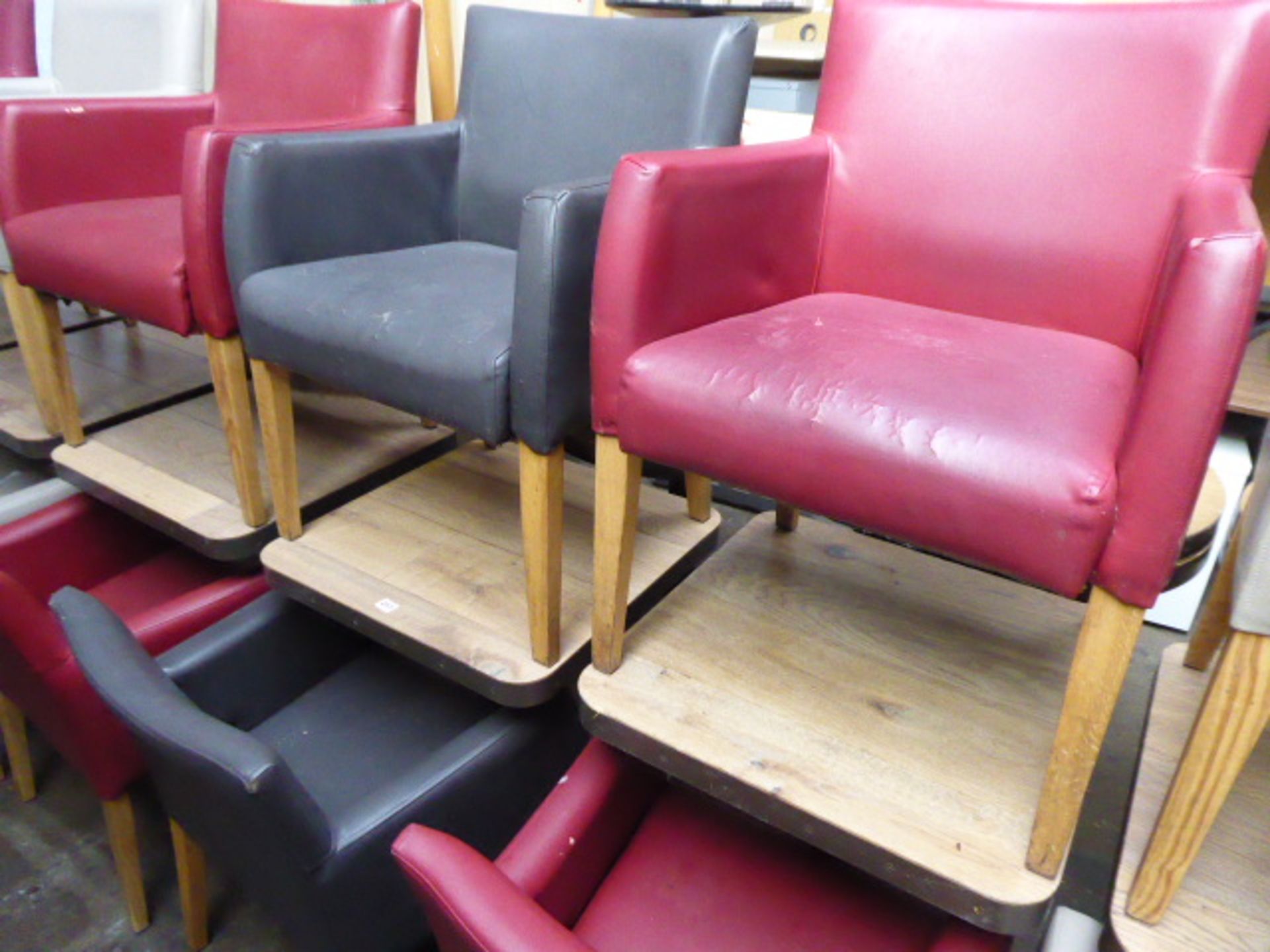 6 leather effect bistro armchairs with 3 heavy square top oak finish and metal banded tables