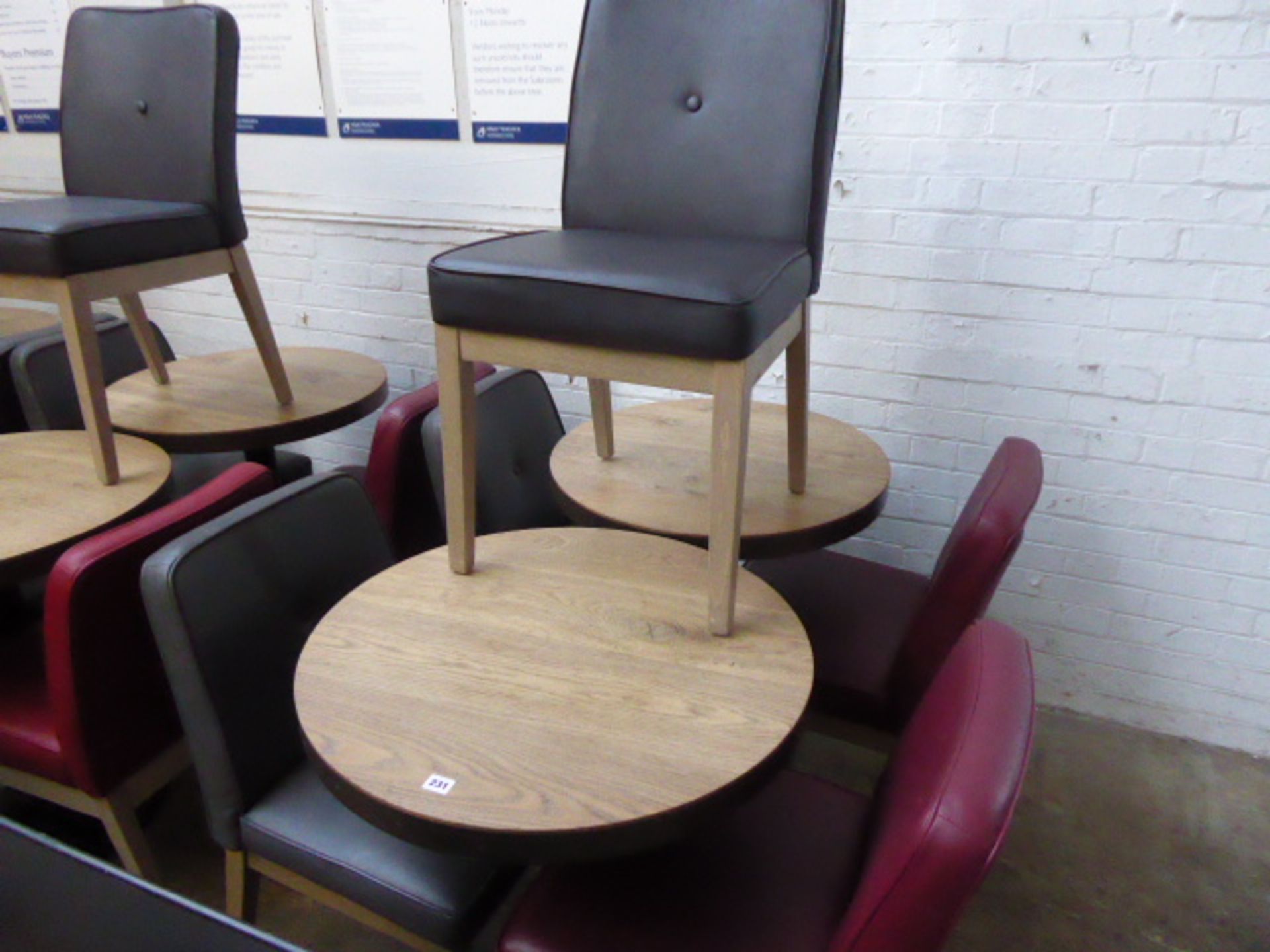 3 grey and 2 red leather effect bistro chairs with 2 70cm diameter oak and metal banded circular top