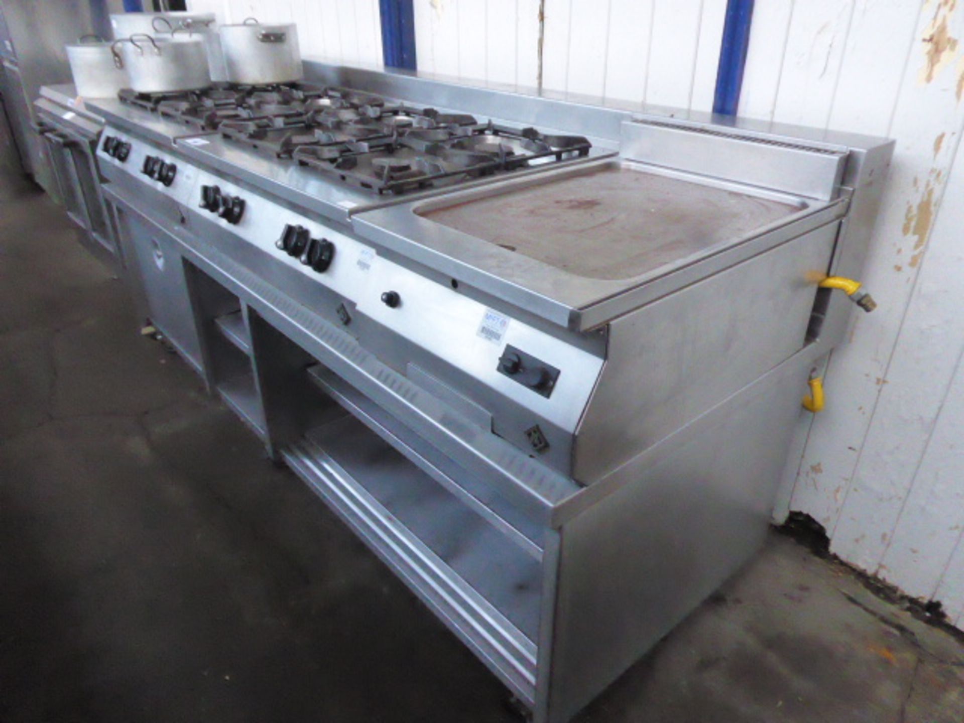 (145) 210cm gas MKN suite to include 2 4 burner cookers, a flat plate griddle on customised
