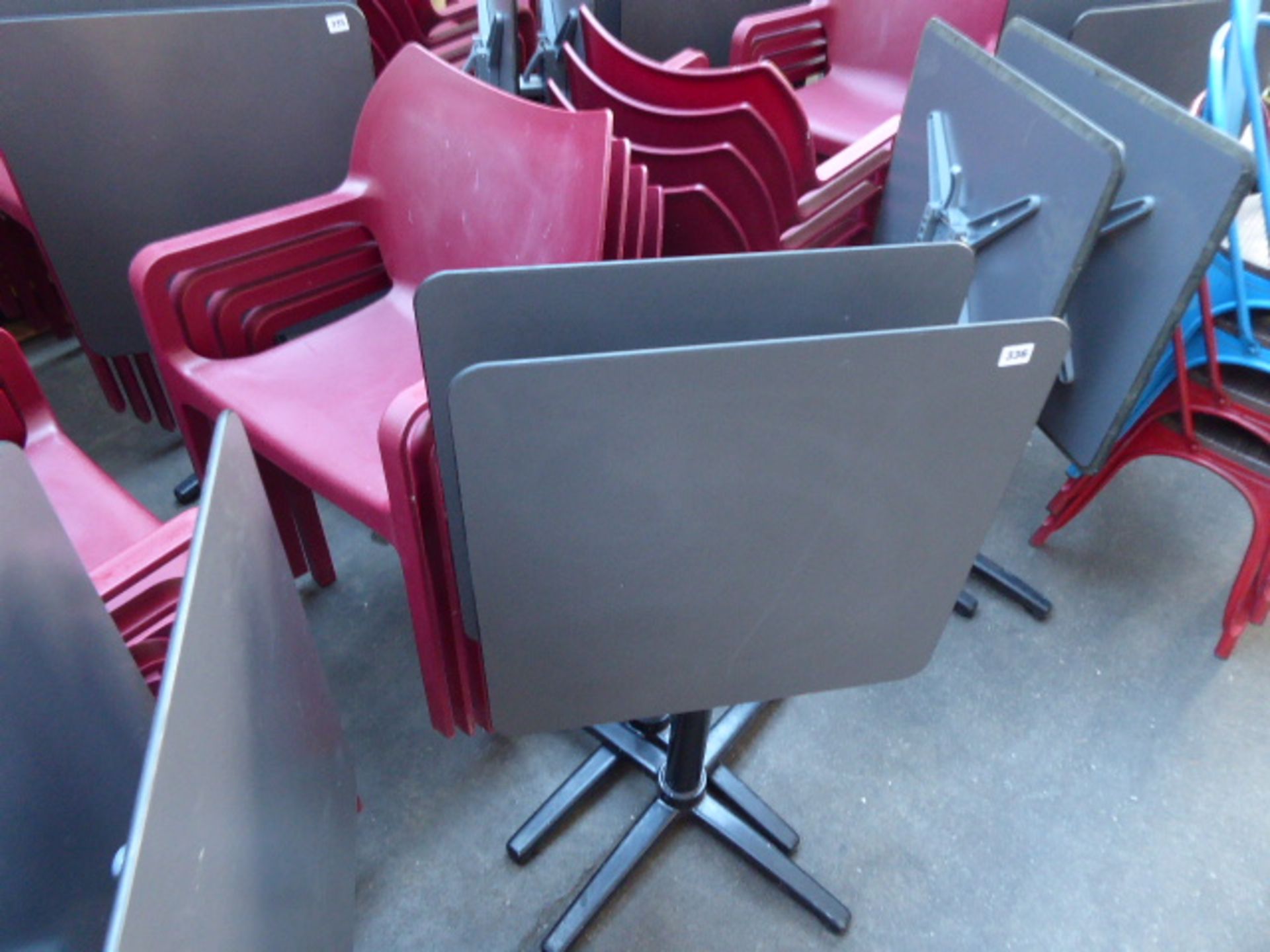 Set of bistro/cafe furniture comprising of 4 burgundy heavy duty plastic stacking chairs with 2 60cm