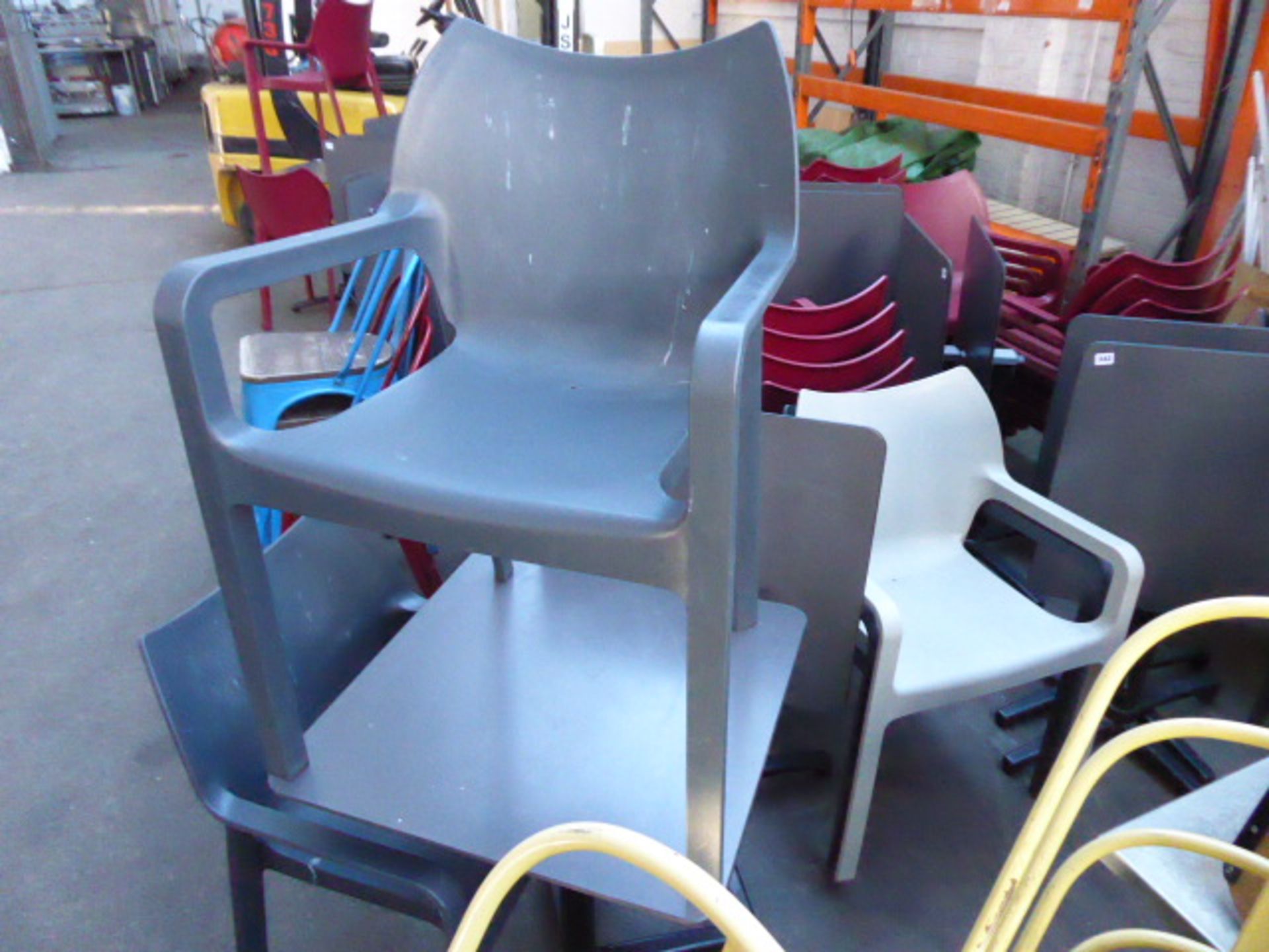 Set of bistro/cafe furniture comprising of 4 grey heavy duty plastic stacking chairs with 2 60cm