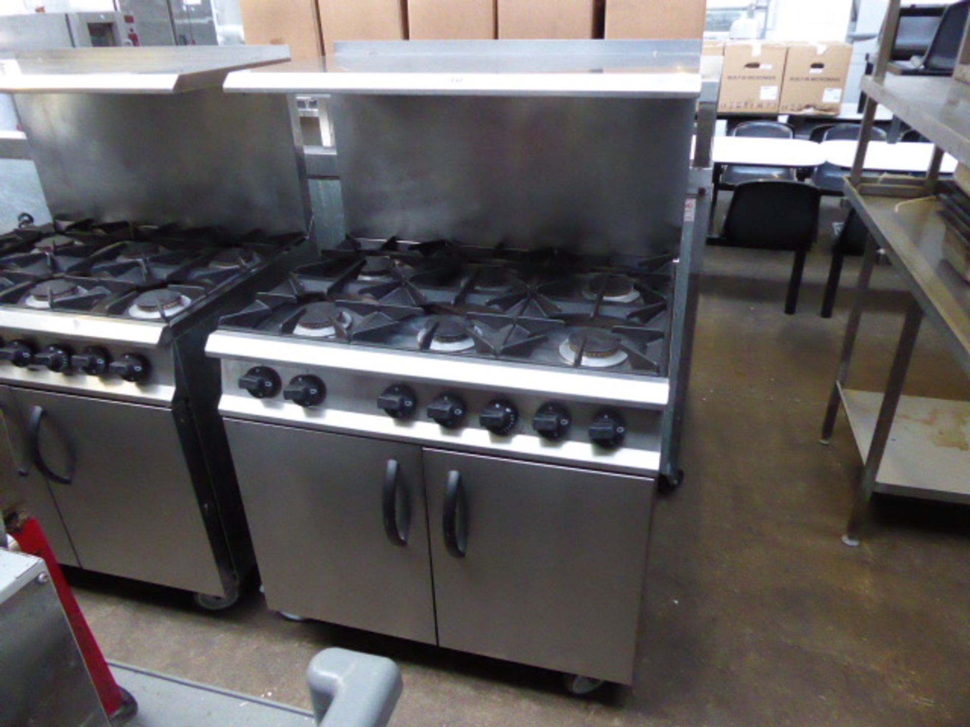 90cm gas Moorwood Vulcan 6 burner cooker with 2 doors under and shelf over on castors