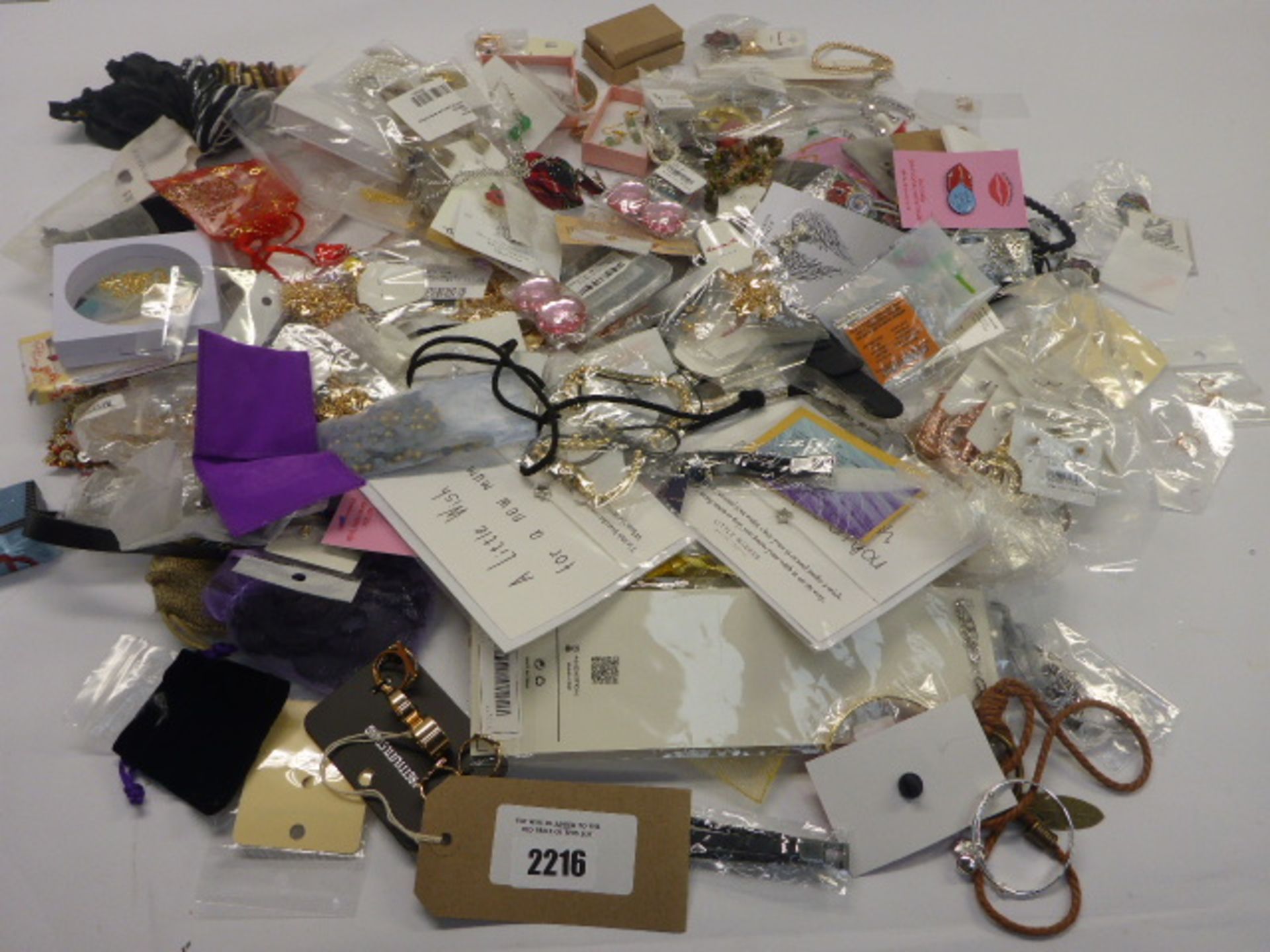 Bag containing various items of costume jewellery