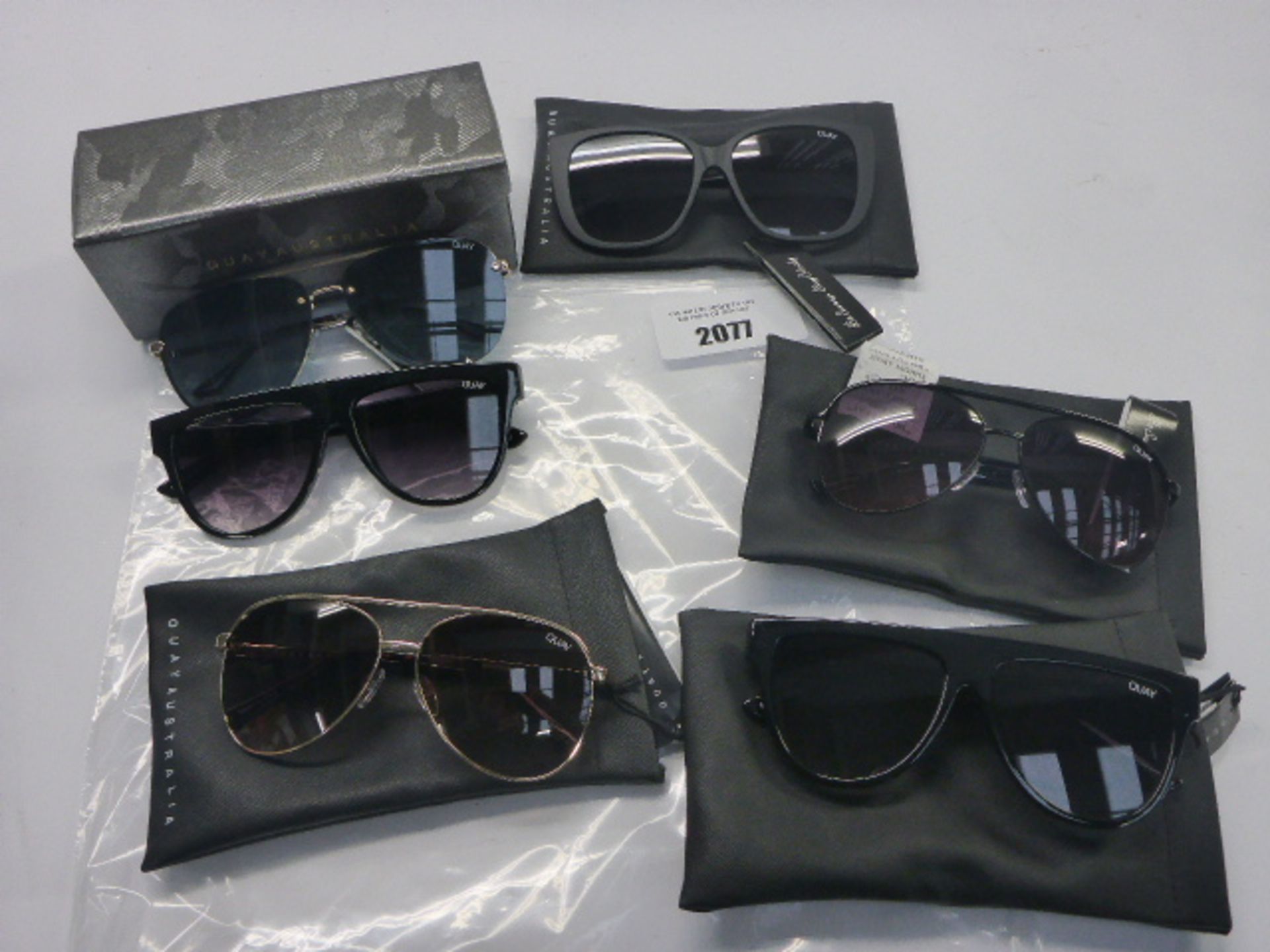 Six Quay Australia Sunglasses in soft and hard cases.