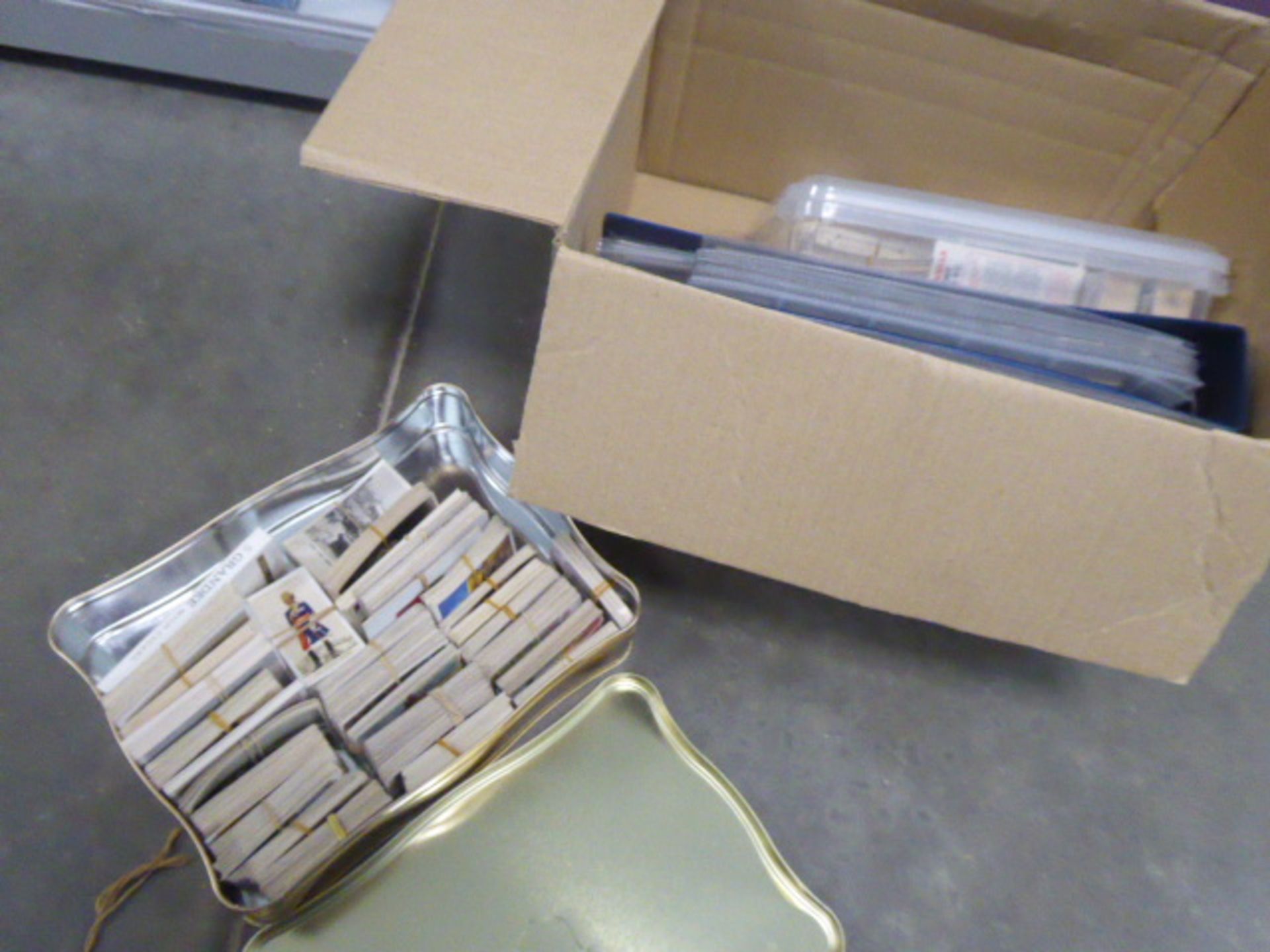 Box of various cigarette card collectors sets
