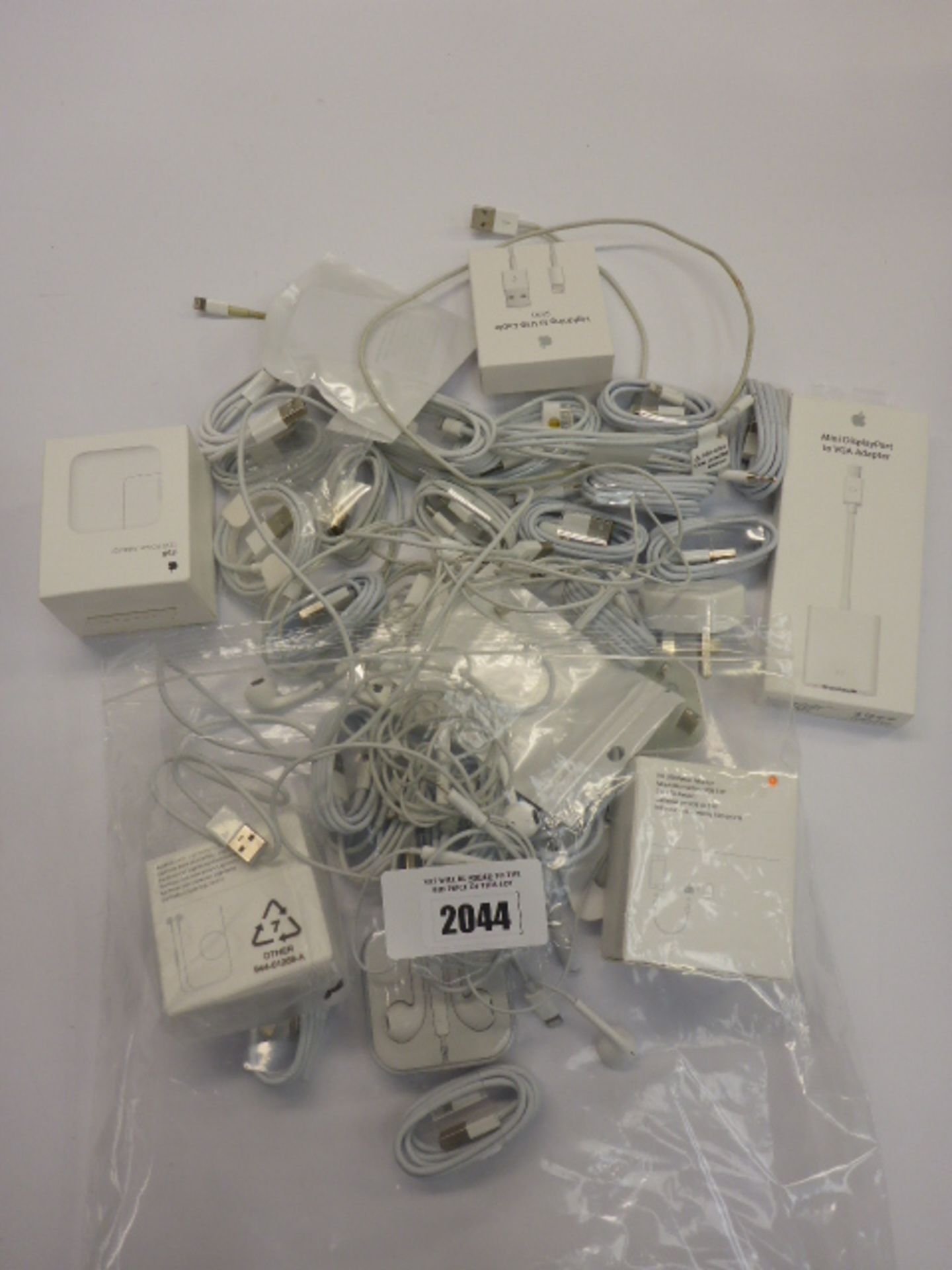 Quantity of various lightning cables, plug adapters and earphones