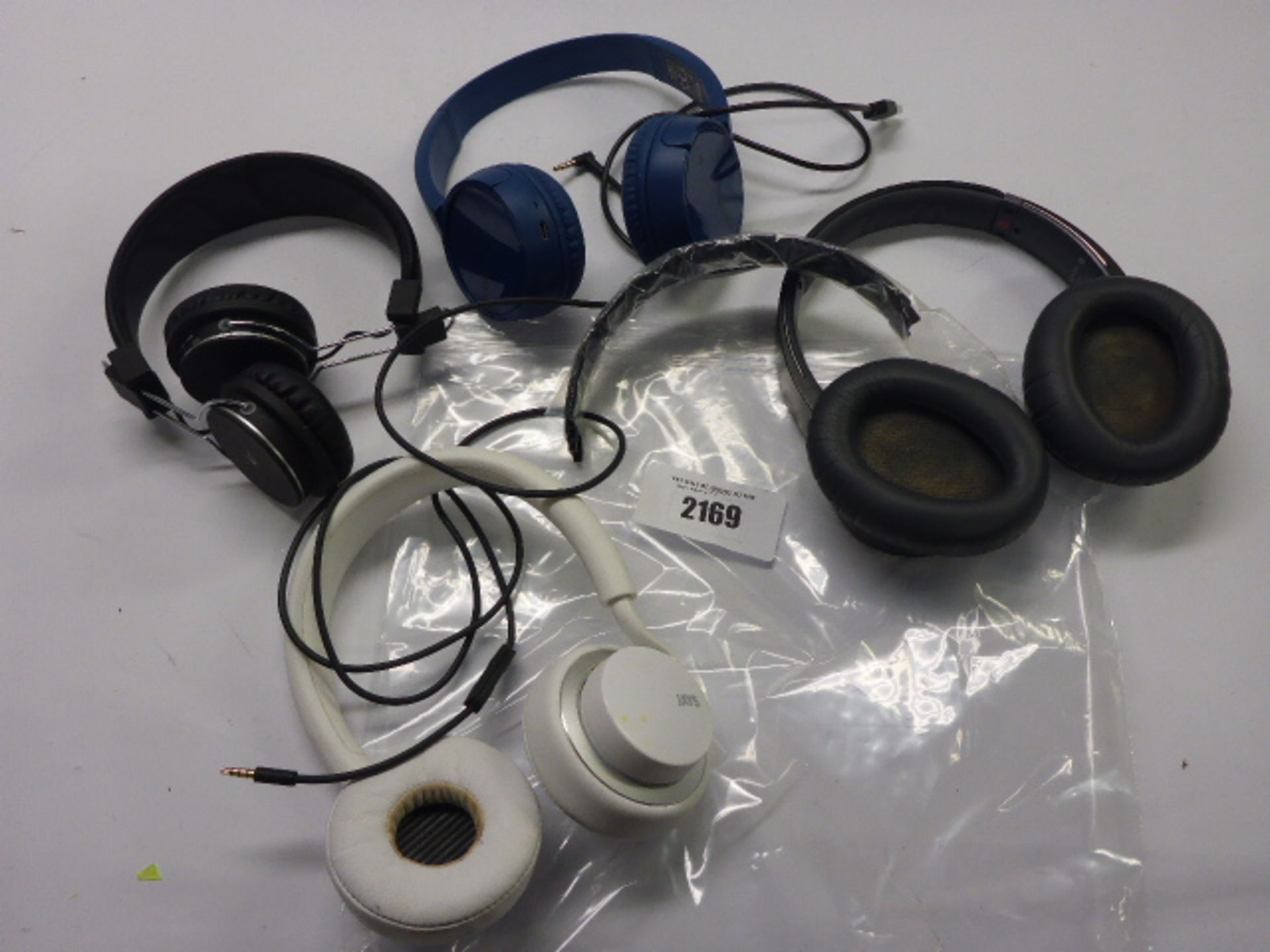 Bag containing quantity of various headphones