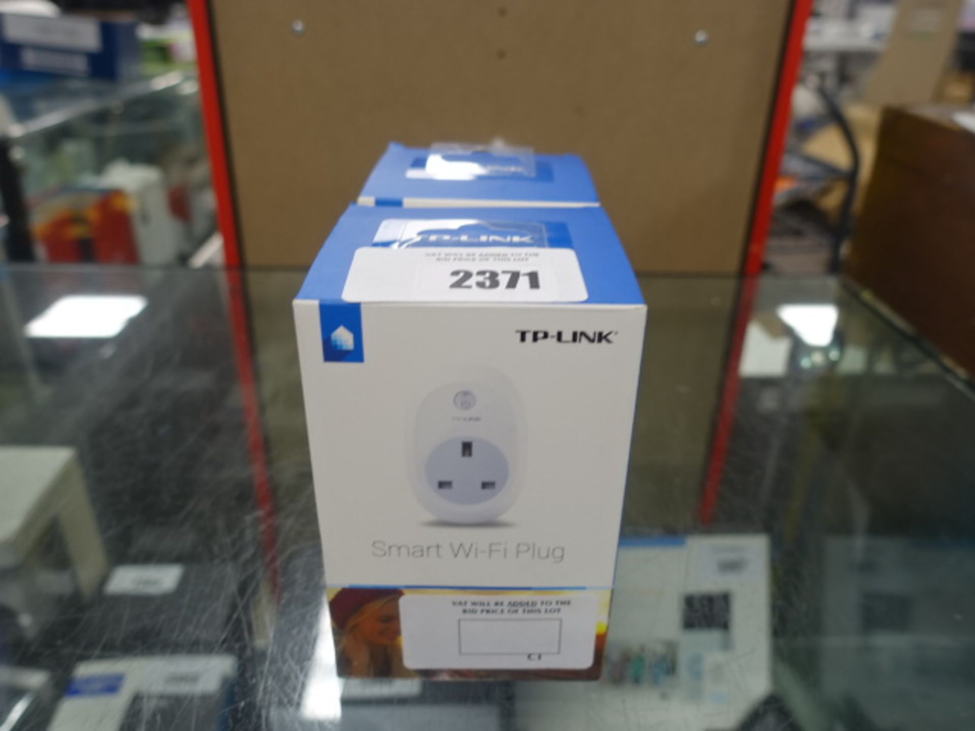 2 boxed TP Link wifi smart plugs