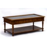 A contemporary Spanish walnut bijouterie table, the glazed surface over a display section,