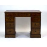 A Victorian mahogany twin pedestal desk,