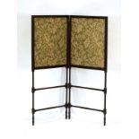 A late 19th century mahogany two-fold screen inset with two floral panels, h.