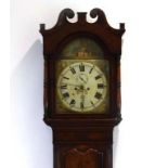 An 18th century longcase clock, the painted face with secondary dial and date aperture,