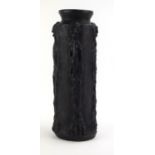 A 1960/70's pottery vase with a black glaze, relief decorated with Modigliani-type figures, h.