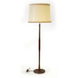 A 1970's teak and reeded brass standard lamp CONDITION REPORT: Lead cut,