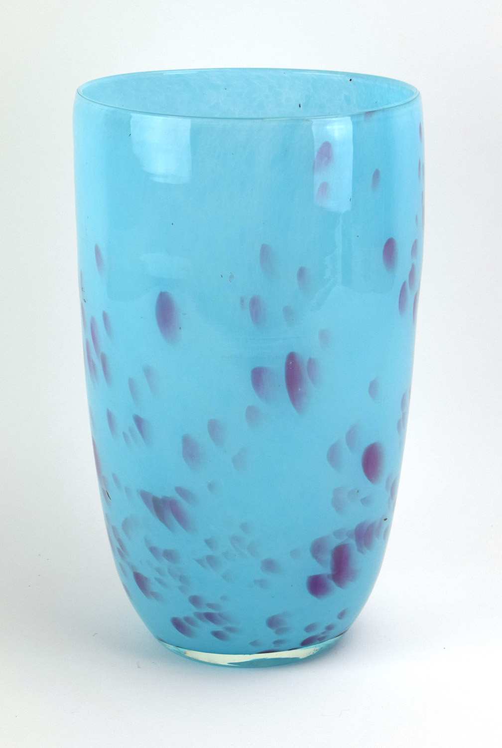 A 1970/80's turquoise cased glass vase with pale pink fish-scale type decoration, h.