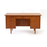 A 1960's Danish teak and crossbanded desk,