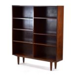 A 1960's Danish rosewood open-fronted adjustable bookcase, on turned legs, w. 124 cm, d. 27 cm, h.