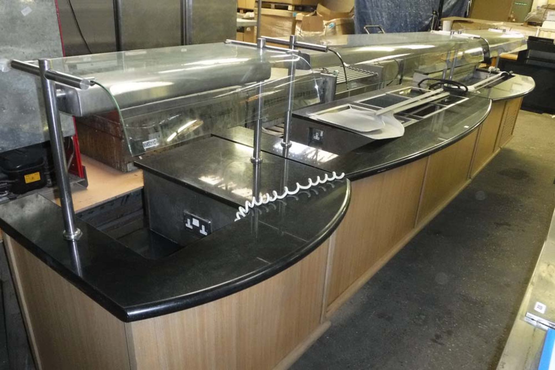 Large servery consisting of 3 sections, each on mobile castors, manufactured by EMH Intl. Ltd.