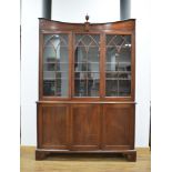 A 19th century mahogany bookcase, the three glazed doors over three panelled doors, on bracket feet,