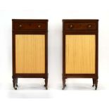 A pair of early 19th century mahogany side cabinets,