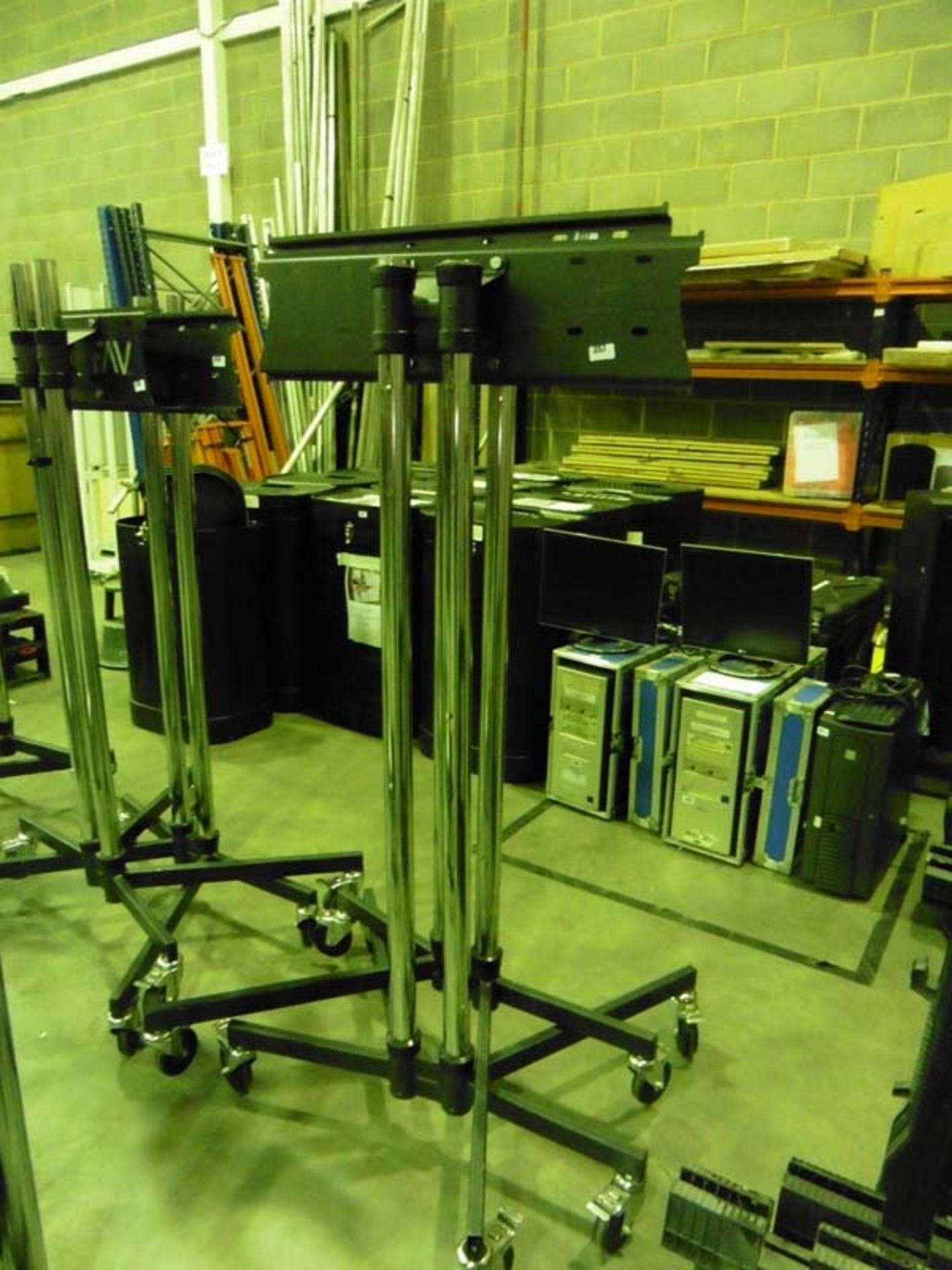 2 Unicol monitor stands on wheels