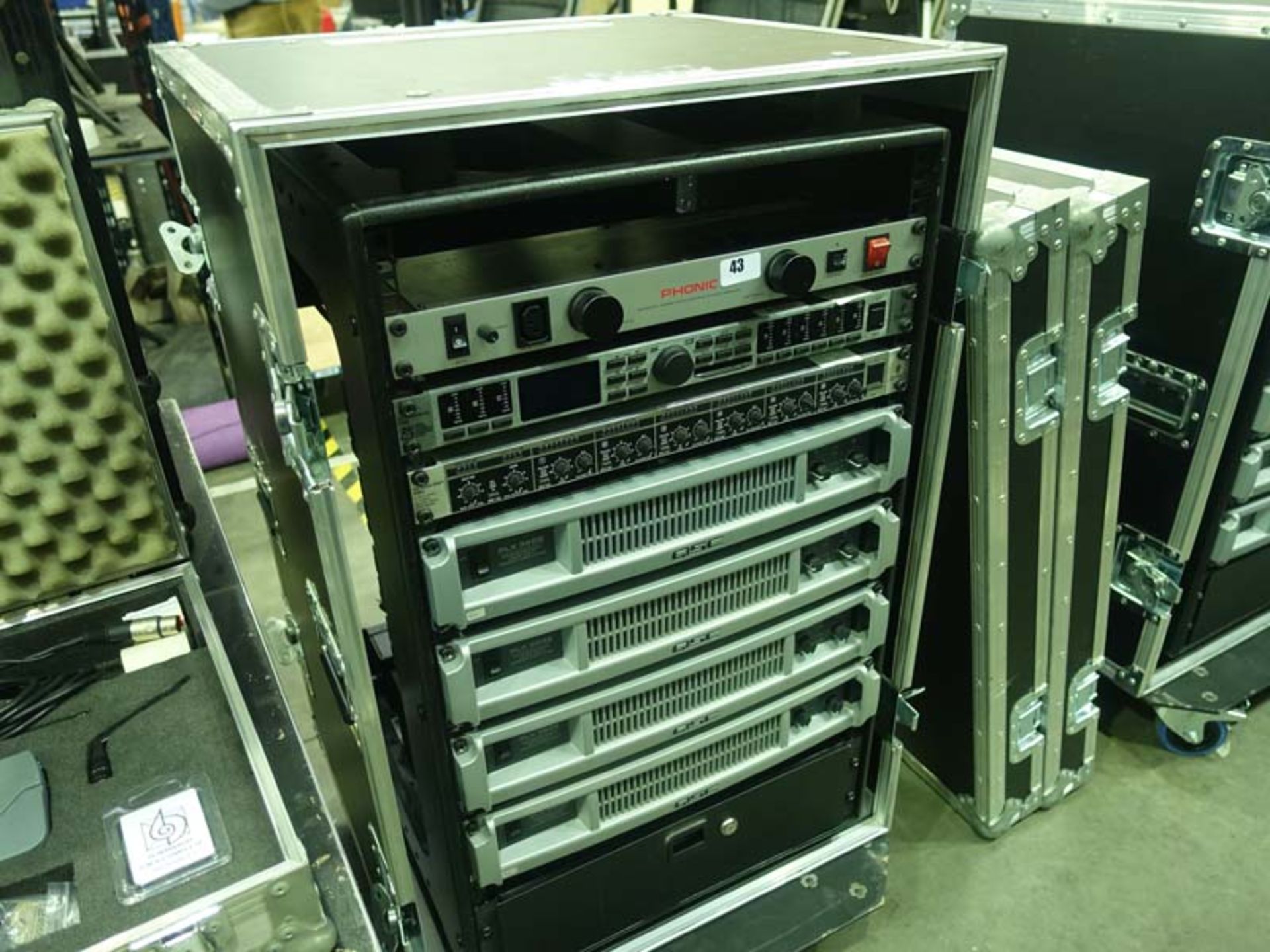 Sound system amp rack set in wheeled case comprising Phonic PPC 8000E power conditioner with light
