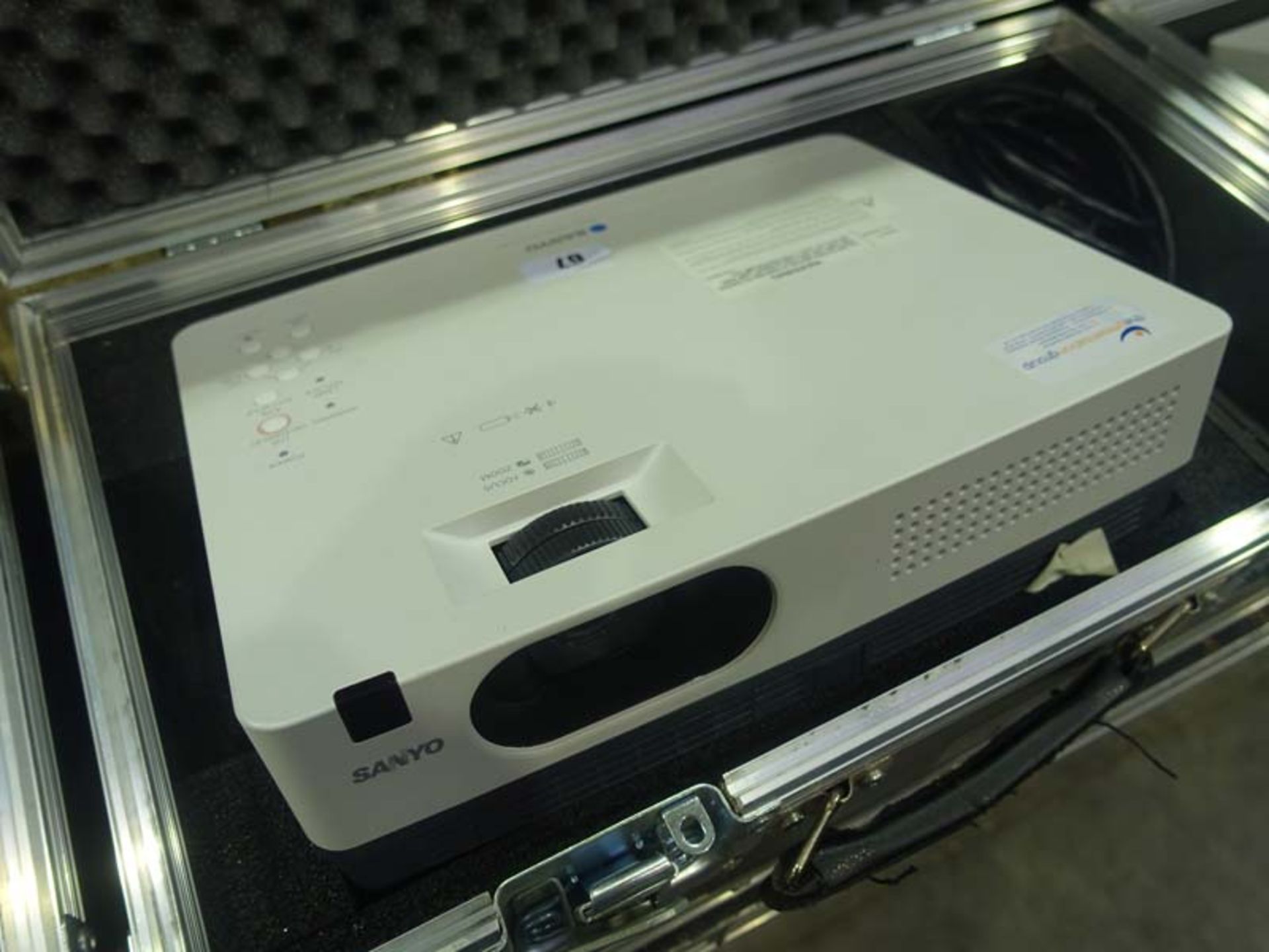 Sanyo model PLCXW200 XGA projector with accessories and case