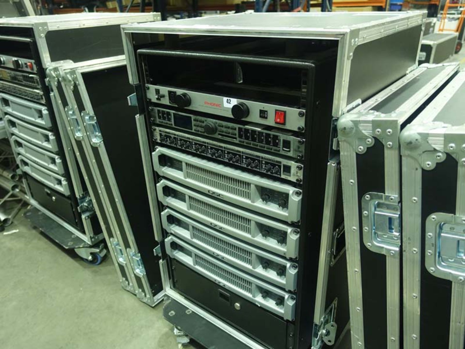 Sound system amp rack set in wheeled case comprising Phonic PPC 8000E power conditioner with light