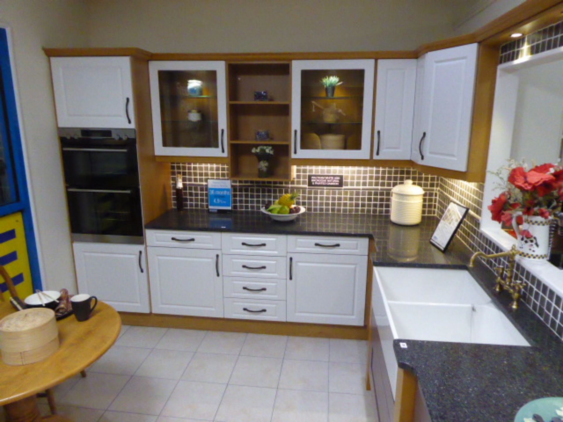 Waltham White Ash Broadoak Natural and Painted Damson kitchen in corner shape with a granite