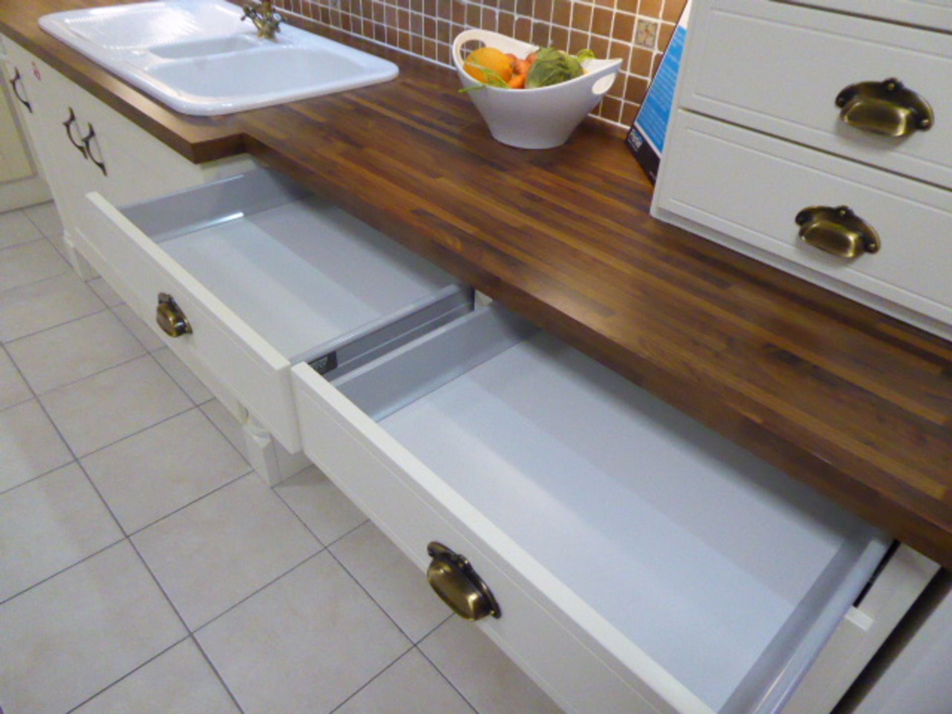 Buttermilk and Litton Soft Cream kitchen in L-shape with a block wood effect worktop. Max - Image 8 of 12