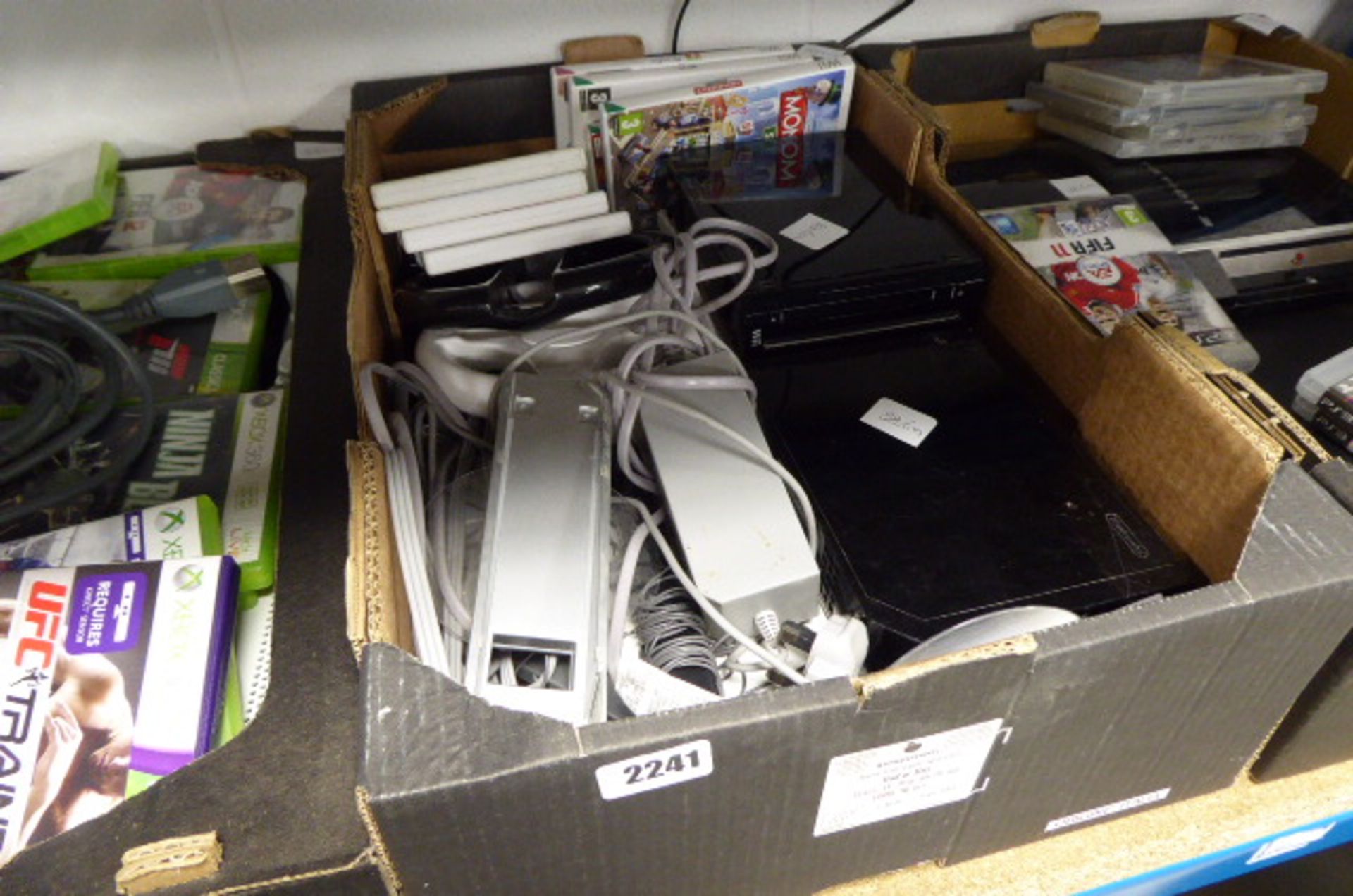 Box containing quantity of Nintendo Wii console accessories