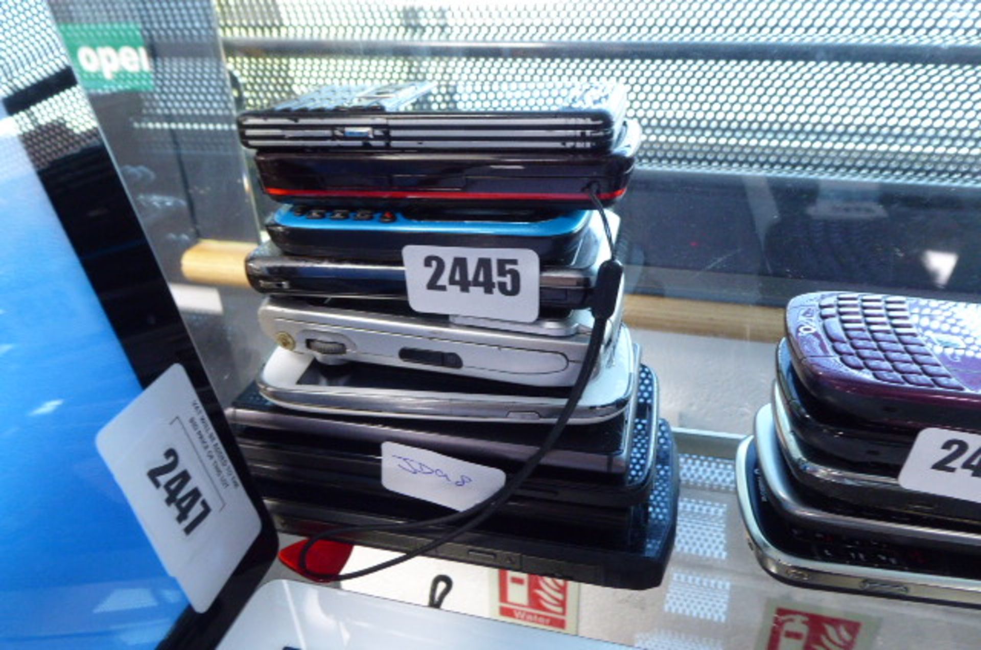 Stack of various mobiles for spares and repairs including Sony, Samsung and others