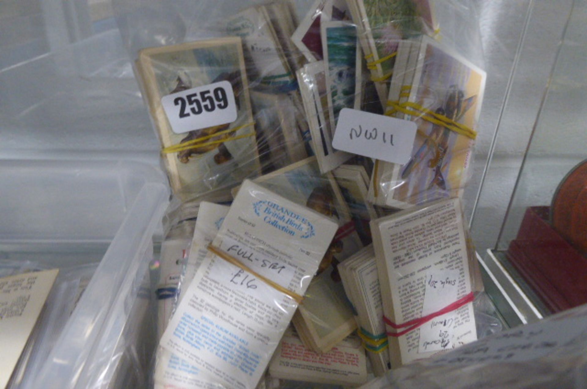 Bag containing cigarette cards, incomplete set