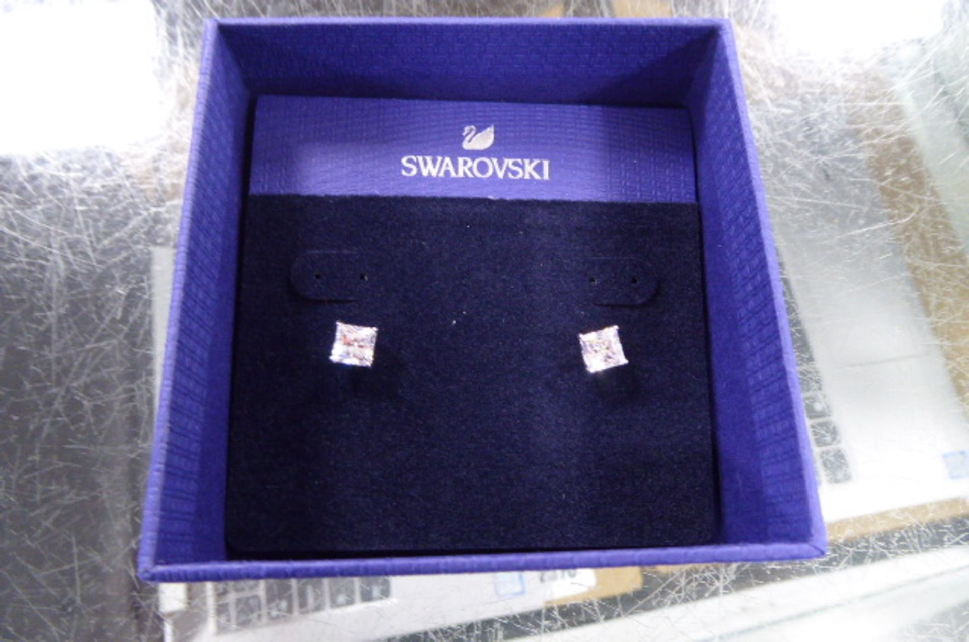 2 boxed sets of Swarovski stud earrings