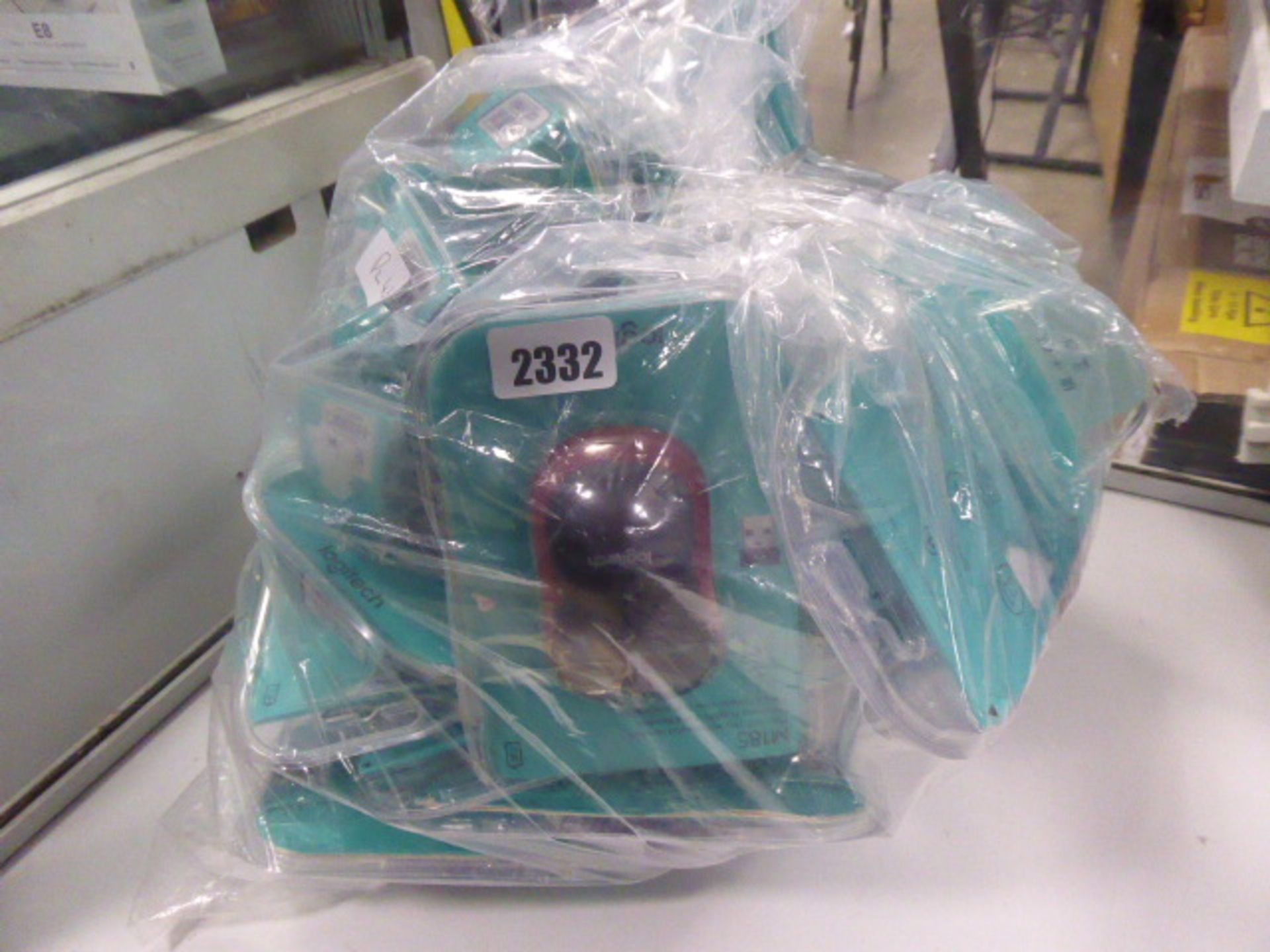 Large bag containing quantity of Logitech wireless mice