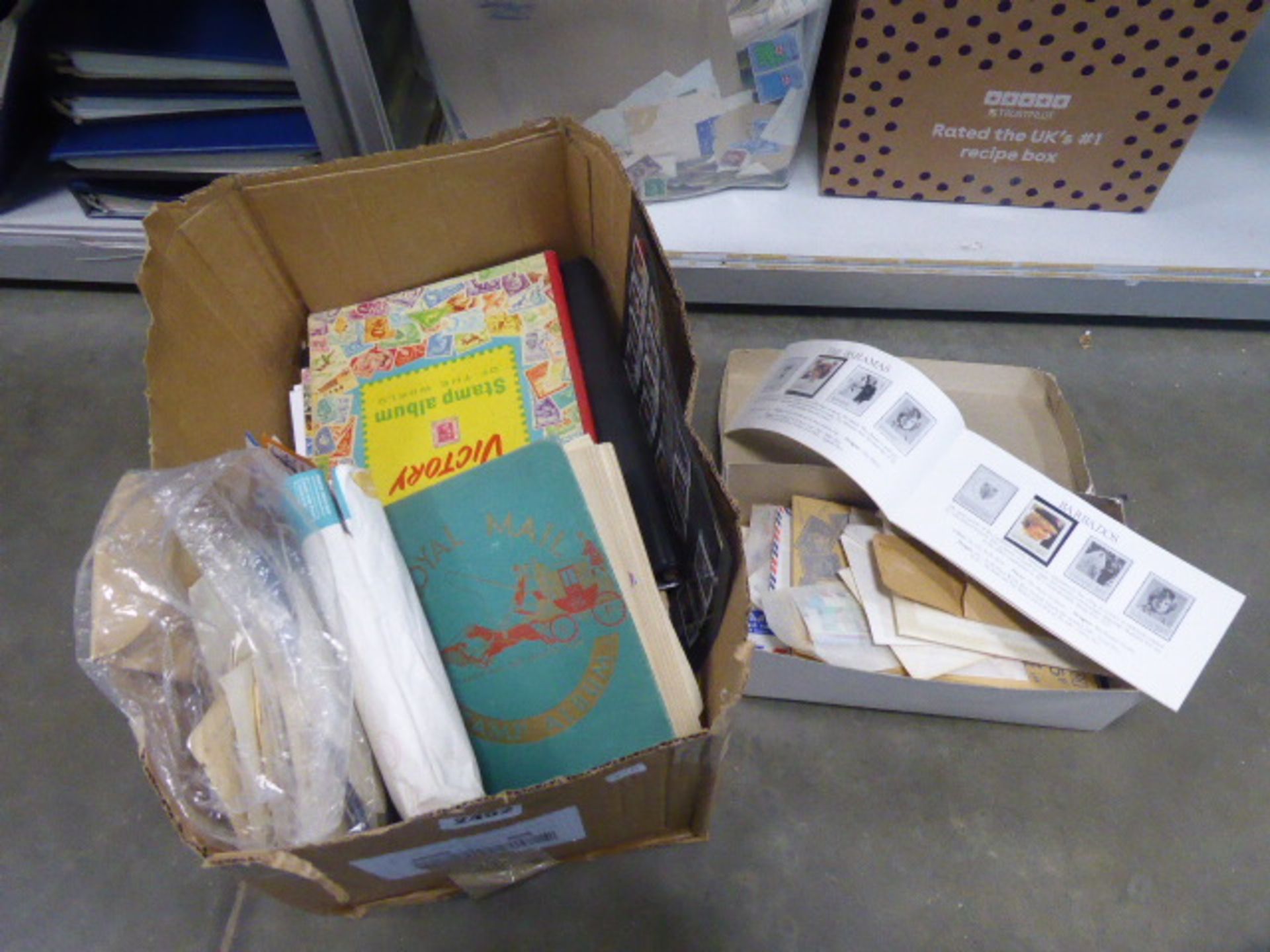 Box of various loose stamps, stamp albums, etc