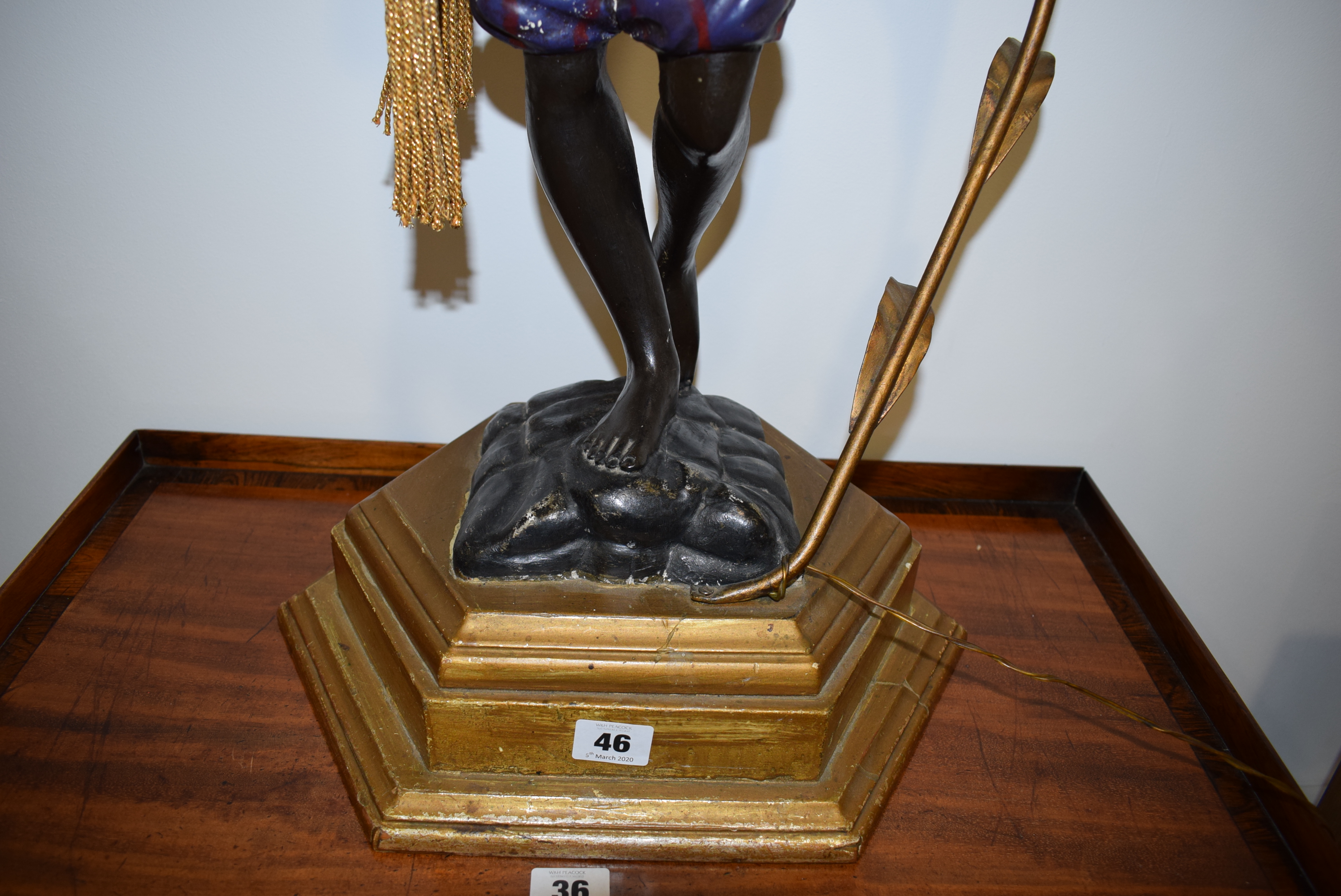 A polychrome and metalwork 'blackamoor' lamp modelled as a young man holding a five-branch foliate - Image 7 of 13