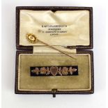 A late 19th/early 20th century 15ct yellow gold stick pin set small diamond, l.